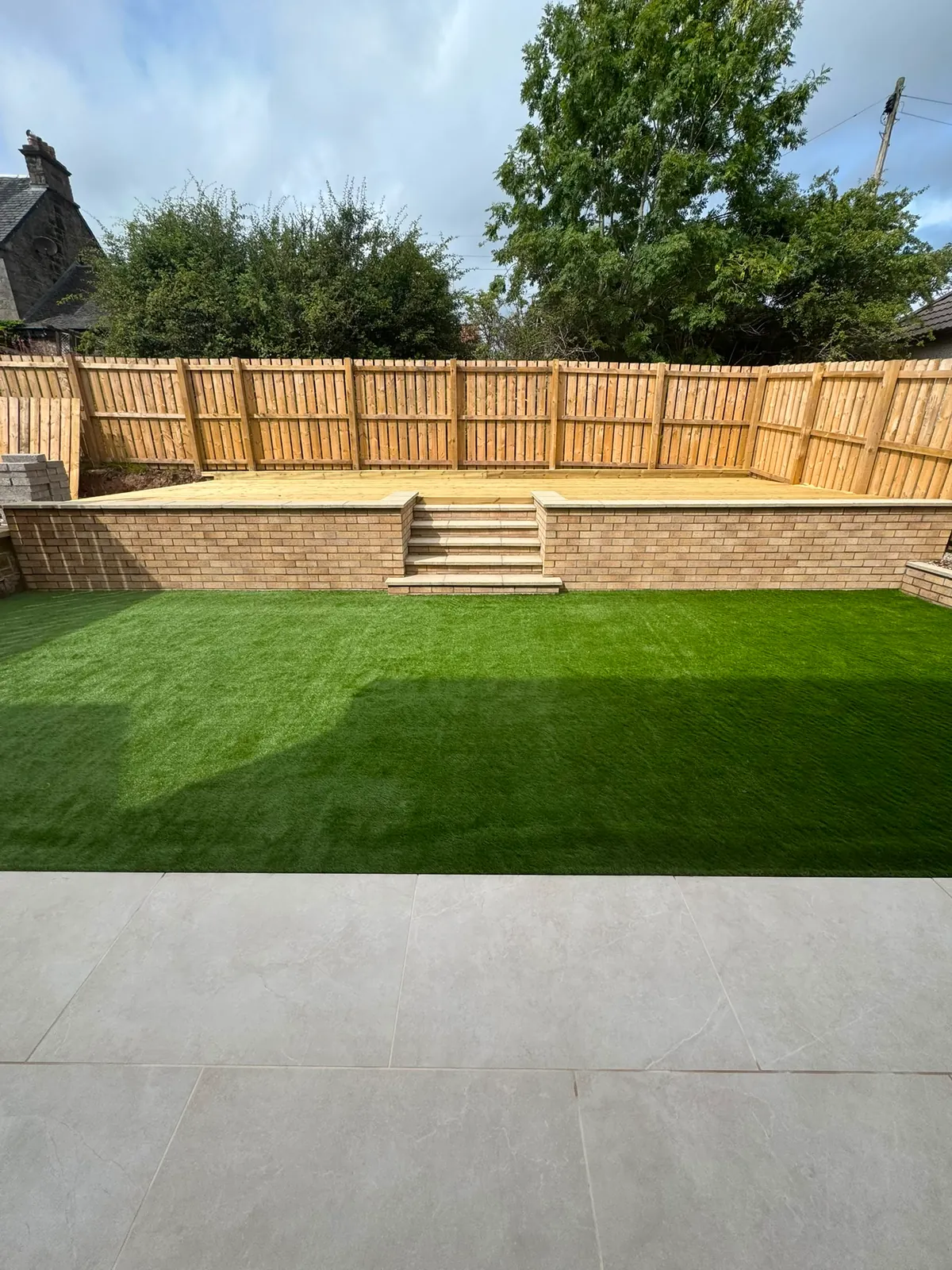 Multi-Tier Brick Steps, Artificial Turf & Fencing